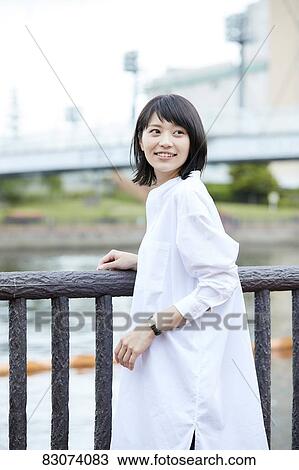 Japanese woman downtown Tokyo View Large Photo Image Stock Image - Japanese woman downtown Tokyo. Fotosearch