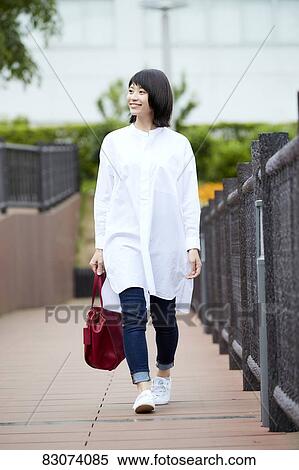 Japanese woman downtown Tokyo View Large Photo Image Stock Photography - Japanese woman downtown Tokyo. Fotosearch
