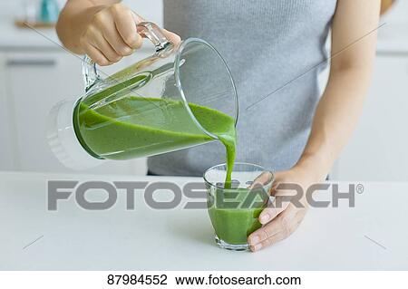 Japanese woman making smoothie in the kitchen View Large Photo Image Stock Image - Japanese woman making smoothie in the kitchen. Fotosearch