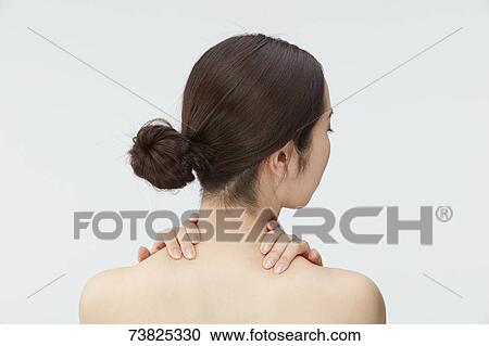Japanese woman massaging View Large Photo Image Stock Image - Japanese woman massaging. Fotosearch