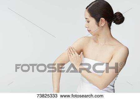 Japanese woman massaging View Large Photo Image Stock Image - Japanese woman massaging. Fotosearch