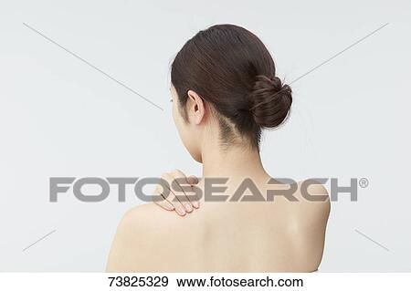 Japanese woman massaging View Large Photo Image Stock Photo - Japanese woman massaging. Fotosearch