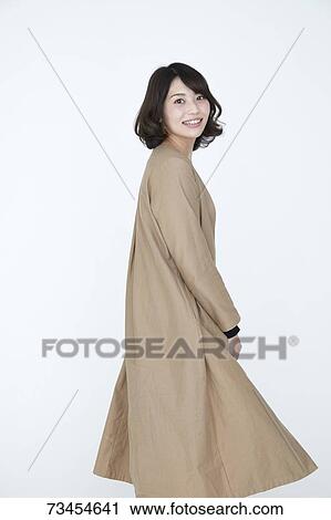 Stock Image - Japanese woman on white background. Fotosearch