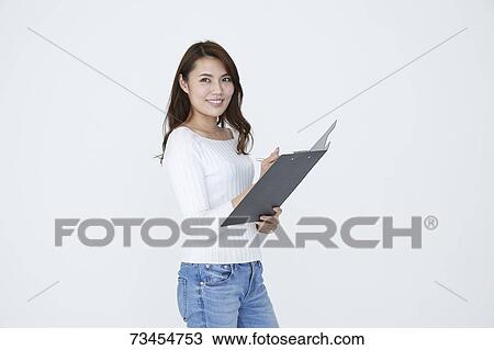 Stock Image - Japanese woman on white background. Fotosearch