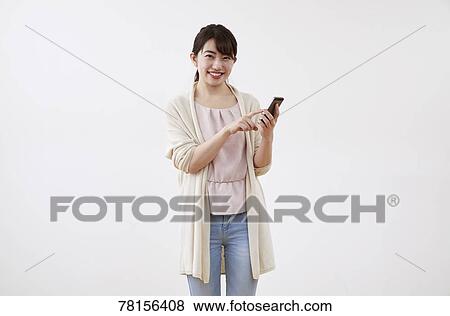 Stock Photo - Japanese woman on white background. Fotosearch