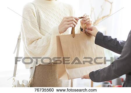 Japanese woman shopping View Large Photo Image Stock Image - Japanese woman shopping. Fotosearch