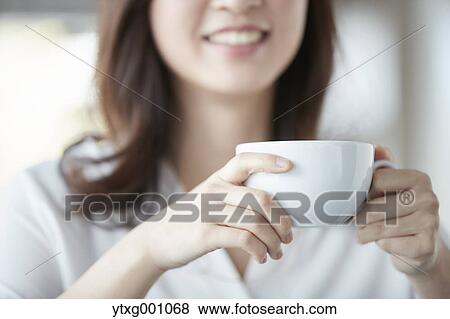 Japanese woman stylish cafe View Large Photo Image Stock Photo - Japanese woman stylish cafe. Fotosearch