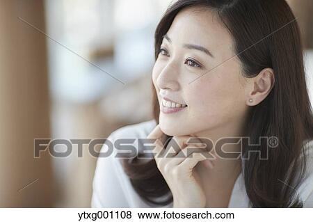 Stock Photo - Japanese woman stylish cafe. Fotosearch