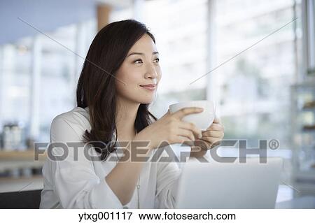 Japanese woman stylish cafe View Large Photo Image Stock Photo - Japanese woman stylish cafe. Fotosearch