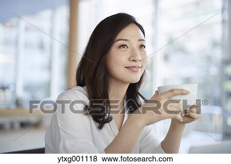 Japanese woman stylish cafe View Large Photo Image Stock Photo - Japanese woman stylish cafe. Fotosearch