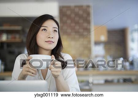 Japanese woman stylish cafe View Large Photo Image Stock Photo - Japanese woman stylish cafe. Fotosearch