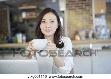 Japanese woman stylish cafe View Large Photo Image Stock Photograph - Japanese woman stylish cafe. Fotosearch