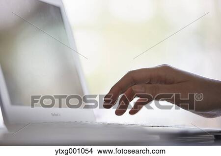 Japanese woman with laptop in a stylish cafe View Large Photo Image Picture - Japanese woman with laptop in a stylish cafe. Fotosearch