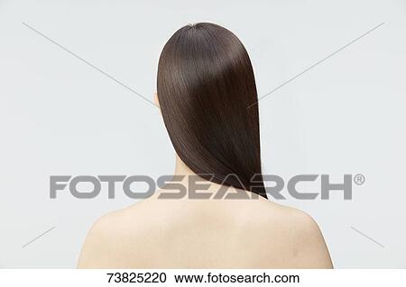 Stock Image - Japanese woman with silky hair. Fotosearch