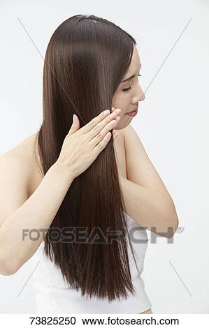 Japanese woman with silky hair View Large Photo Image Stock Image - Japanese woman with silky hair. Fotosearch