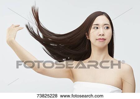 Japanese woman with silky hair View Large Photo Image Stock Photo - Japanese woman with silky hair. Fotosearch