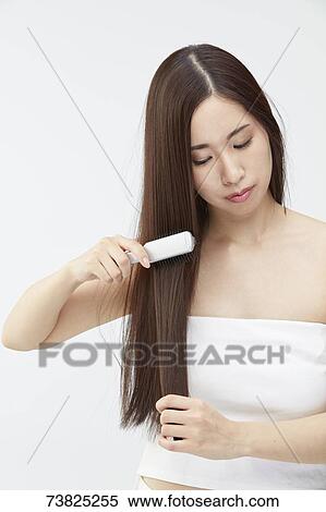 Japanese woman with silky hair View Large Photo Image Stock Photography - Japanese woman with silky hair. Fotosearch