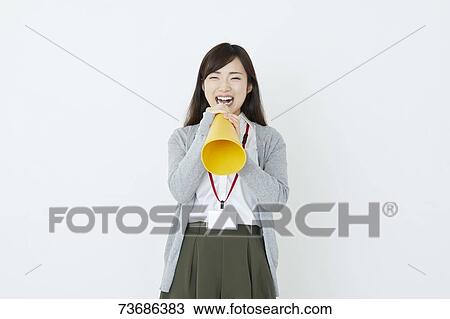 Stock Image - Japanese young woman on white background. Fotosearch