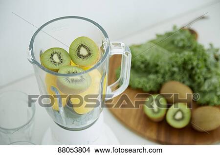 Picture - Juycer in the kitchen. Fotosearch