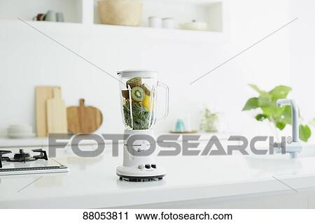 Juycer in the kitchen View Large Photo Image Stock Image - Juycer in the kitchen. Fotosearch