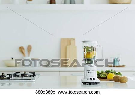 Juycer in the kitchen View Large Photo Image Stock Photography - Juycer in the kitchen. Fotosearch
