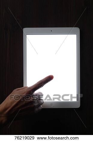Male hand working on tablet View Large Photo Image Stock Photo - Male hand working on tablet. Fotosearch