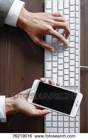 Male hands working on keyboard View Large Photo Image Stock Photograph - Male hands working on keyboard. Fotosearch