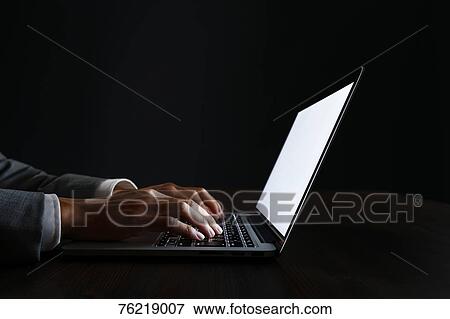 Stock Photo - Male hands working on laptop. Fotosearch