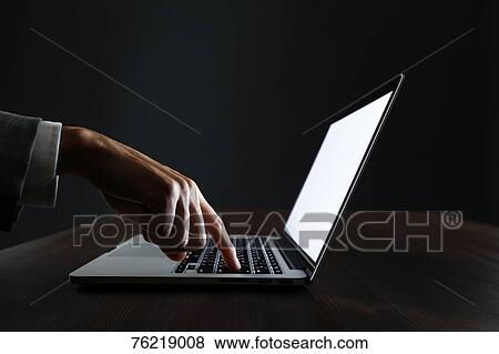Stock Photo - Male hands working on laptop. Fotosearch