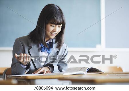 Mixed-race student in the classroom View Large Photo Image Picture - Mixed-race student in the classroom. Fotosearch