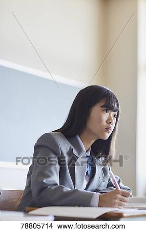Mixed-race student in the classroom View Large Photo Image Picture - Mixed-race student in the classroom. Fotosearch