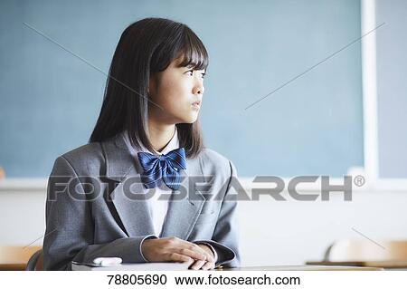 Mixed-race student in the classroom View Large Photo Image Stock Image - Mixed-race student in the classroom. Fotosearch
