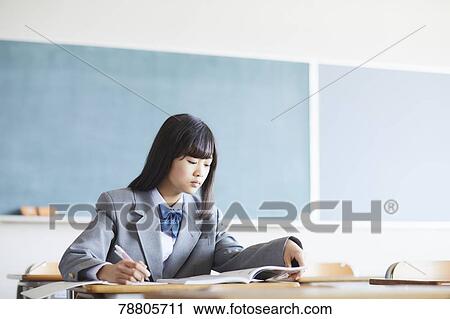 Mixed-race student in the classroom View Large Photo Image Stock Image - Mixed-race student in the classroom. Fotosearch