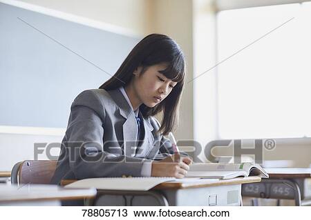 Mixed-race student in the classroom View Large Photo Image Stock Image - Mixed-race student in the classroom. Fotosearch