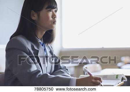 Mixed-race student in the classroom View Large Photo Image Stock Image - Mixed-race student in the classroom. Fotosearch