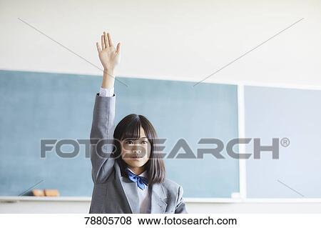 Stock Photo - Mixed-race student in the classroom. Fotosearch