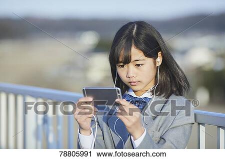 Stock Image - Mixed-race student. Fotosearch