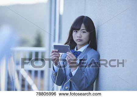 Stock Photograph - Mixed-race student. Fotosearch