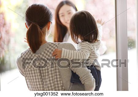 Mother picking up her kid at Japanese kindergarten View Large Photo Image Stock Image - Mother picking up her kid at Japanese kindergarten. Fotosearch