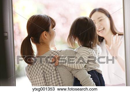 Mother picking up her kid at Japanese kindergarten View Large Photo Image Stock Image - Mother picking up her kid at Japanese kindergarten. Fotosearch