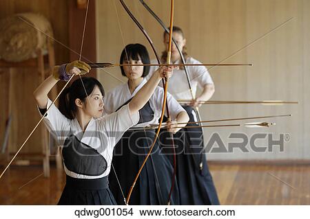 Multi-ethnic group of traditional archery athletes practicing View Large Photo Image Picture - Multi-ethnic group of traditional archery athletes practicing. Fotosearch