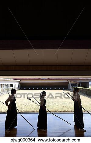 Multi-ethnic group of traditional archery athletes practicing View Large Photo Image Picture - Multi-ethnic group of traditional archery athletes practicing. Fotosearch
