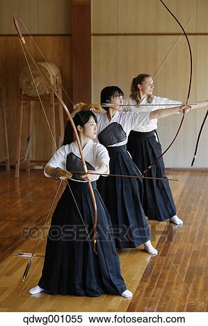 Multi-ethnic group of traditional archery athletes practicing View Large Photo Image Stock Photography - Multi-ethnic group of traditional archery athletes practicing. Fotosearch