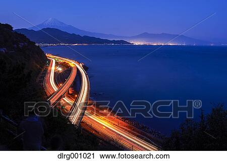 Night view of Mount Fuji and highway from Satta ridge at sunset, Shizuoka Prefecture, Japan View Large Photo Image Stock Image - Night view of Mount Fuji and highway from Satta ridge at sunset, Shizuoka Prefecture, Japan. Fotosearch
