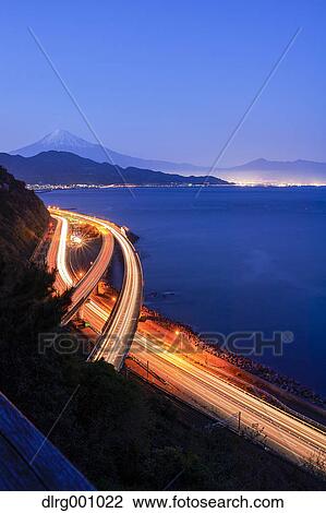 Night view of Mount Fuji and highway from Satta ridge at sunset, Shizuoka Prefecture, Japan View Large Photo Image Stock Image - Night view of Mount Fuji and highway from Satta ridge at sunset, Shizuoka Prefecture, Japan. Fotosearch