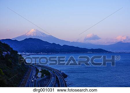 Night view of Mount Fuji and highway from Satta ridge at sunset, Shizuoka Prefecture, Japan View Large Photo Image Stock Image - Night view of Mount Fuji and highway from Satta ridge at sunset, Shizuoka Prefecture, Japan. Fotosearch
