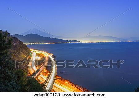 Night view of Mount Fuji and highway from Satta ridge at sunset, Shizuoka Prefecture, Japan View Large Photo Image Stock Image - Night view of Mount Fuji and highway from Satta ridge at sunset, Shizuoka Prefecture, Japan. Fotosearch
