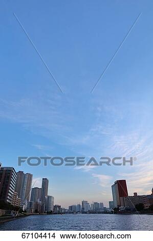 Picture - Office buildings and sky, Tokyo, Japan. Fotosearch