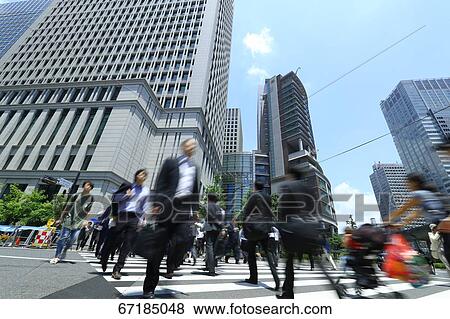 Pedestrians walking in Tokyo, Japan View Large Photo Image Stock Photo - Pedestrians walking in Tokyo, Japan. Fotosearch