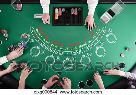 People betting at casino table View Large Photo Image Picture - People betting at casino table. Fotosearch